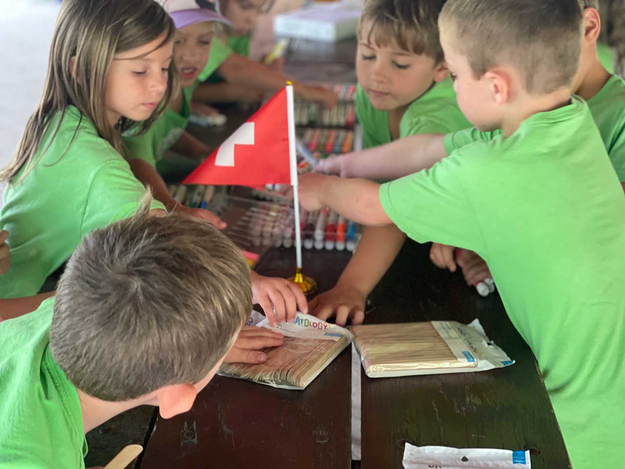 Children Playing With Popsicle Sticks