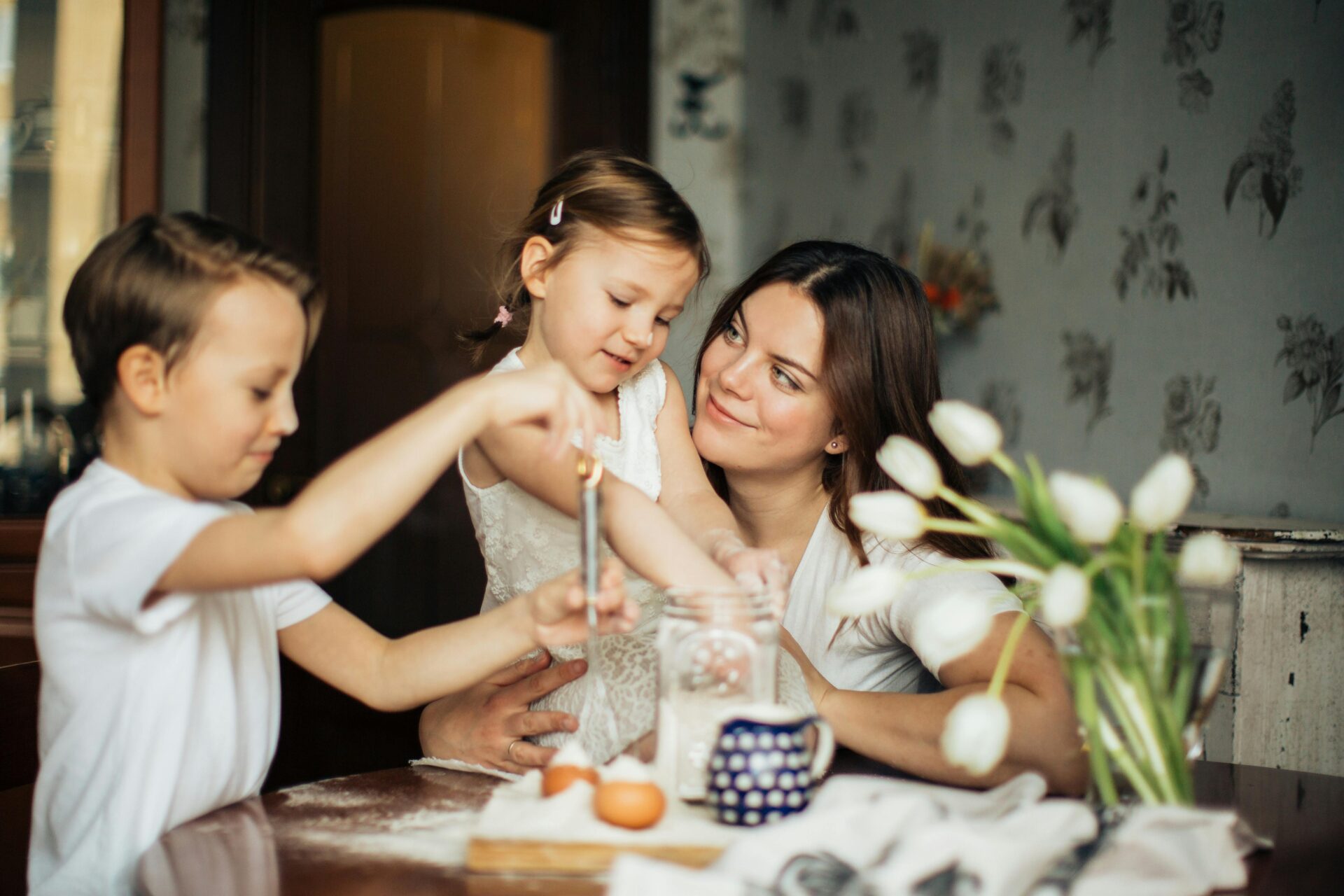 Mother supporting children’s learning styles