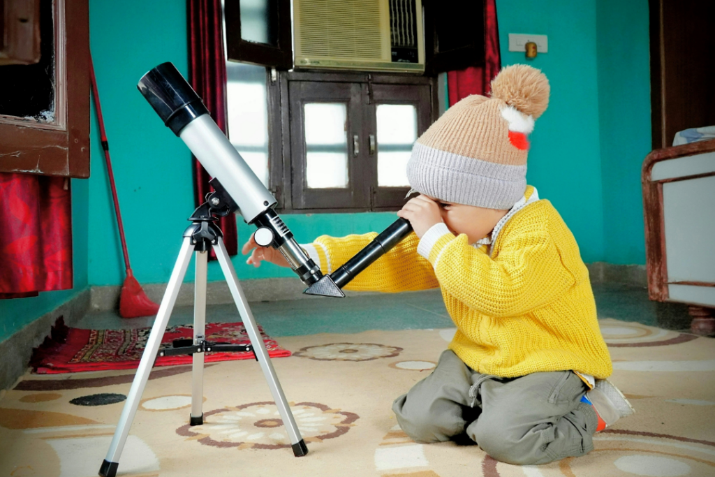 Child learning exploring through inquiry-based learning.