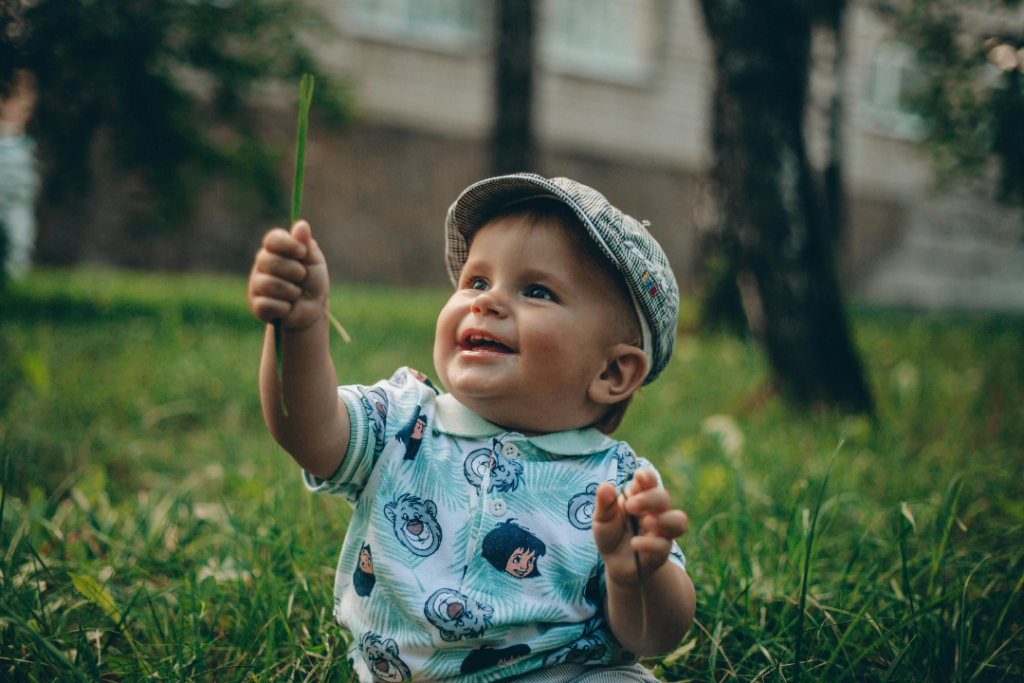 Baby engaging in outdoor learning STEAM activities