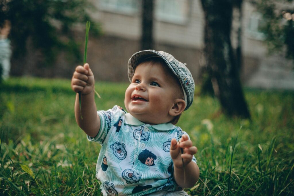 Baby engaging in outdoor learning STEAM activities