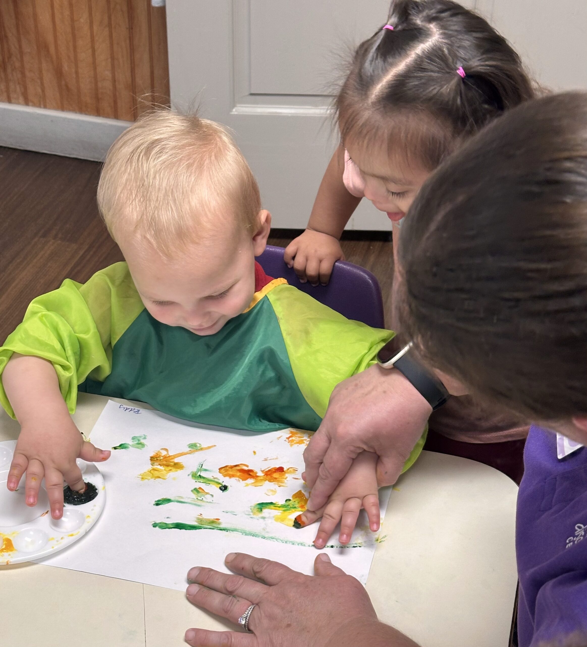 Toledo area early education center students in a hands-on art lesson.