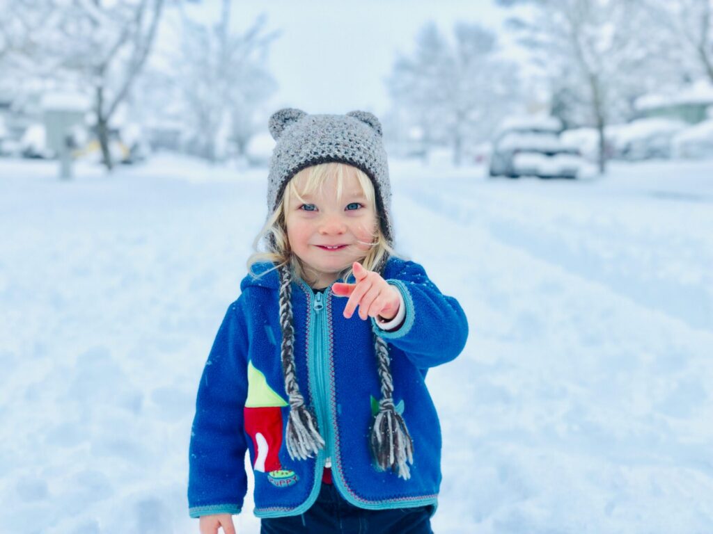 child-outside-during-winter Winter STEAM activities for young children in Toledo, Ohio
