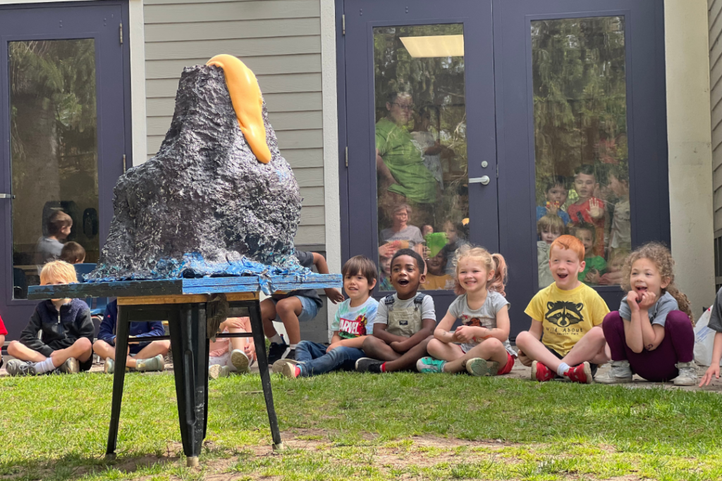 Toledo early education students engaged in a hands-on, Reggio Emilia-inspired volcano lesson