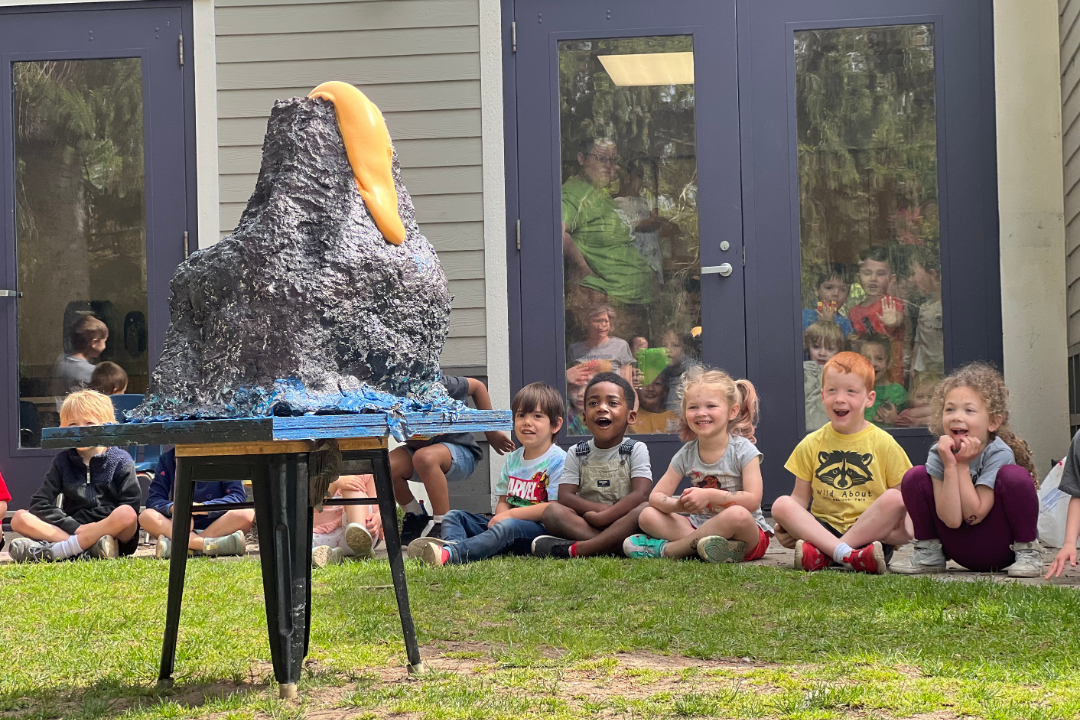 Toledo early education students engaged in a hands-on, Reggio Emilia-inspired volcano lesson